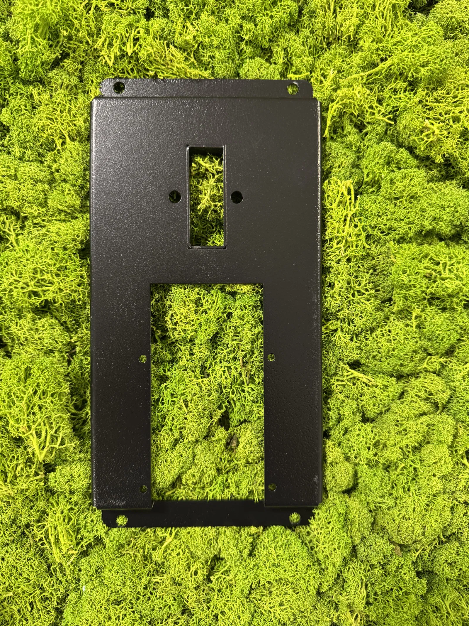 Metallblende für den Münzeinwurf