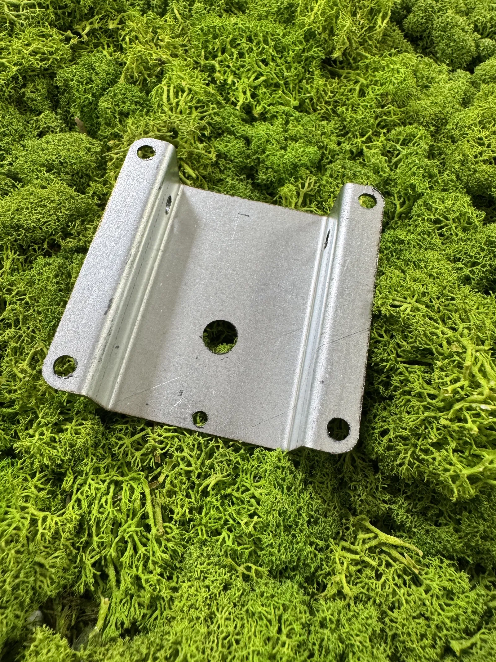 Führungsblech für Münzwechsler-Knopf